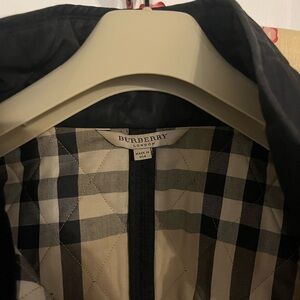Size large black Burberry riding jacket. Great condition.